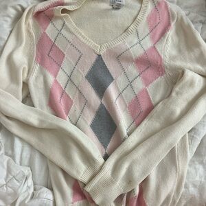 Elegant Pink and Cream Argyle V-Neck Sweater
